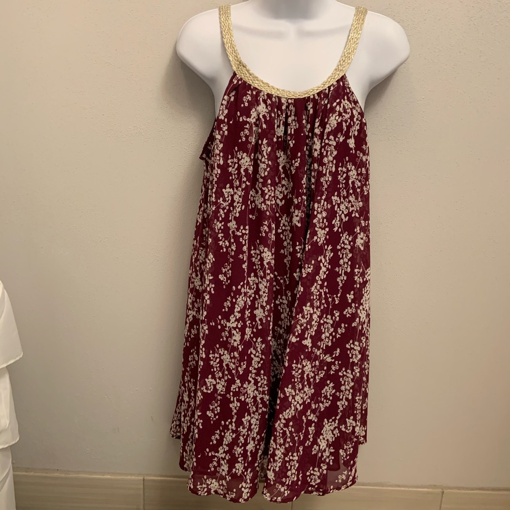Charming Charlie floral dress with gold detail.
